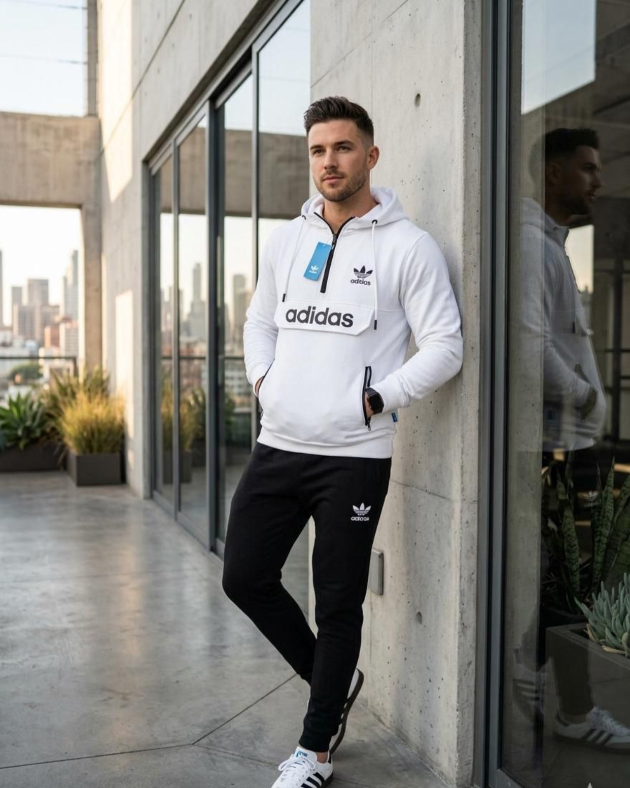 Adidas  hoodie and matching track pants in white and black.